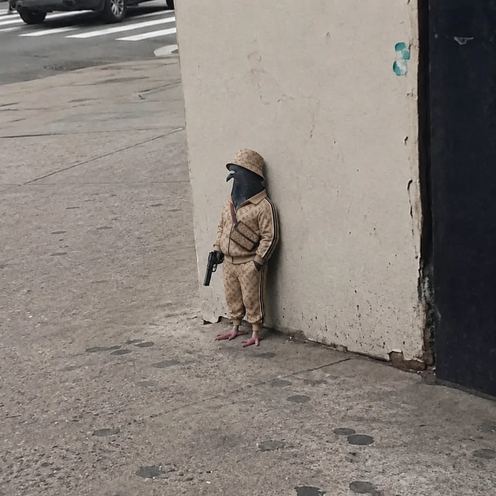 The pigeon leaning against the wall — monogram.